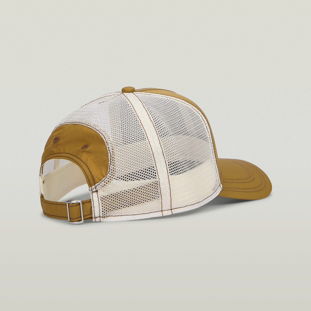 Baseball trucker cap with clip closure featuring classic trucker design and mesh ventilation.