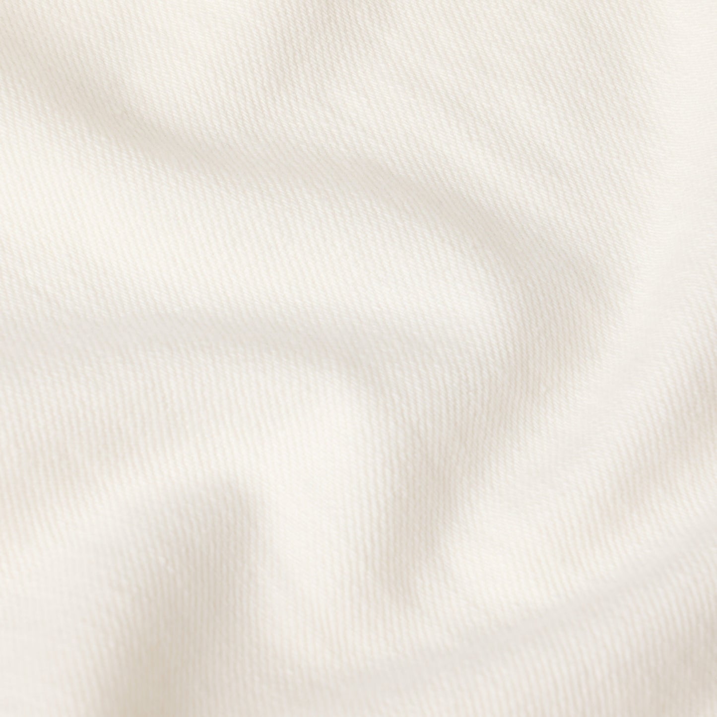 close-up of soft fabric texture for loose fit low rise jeans