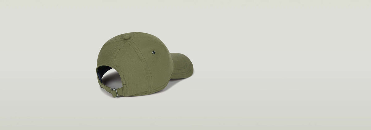 Gorra Originals Baseball con visera curvada y tira trasera ajustable, color verde.