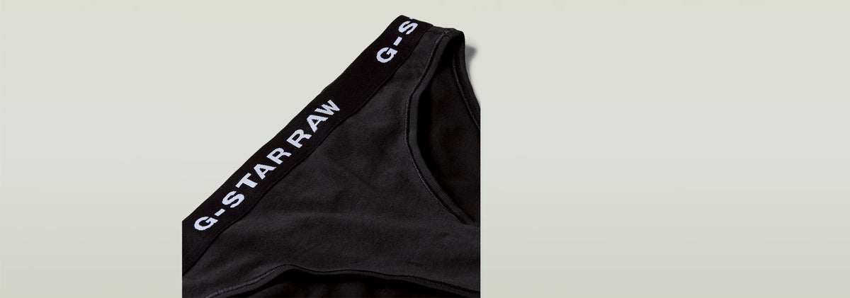 Paquete De Tres Braguitas con cinturilla elástica de G-Star RAW en color negro, suave y transpirable.