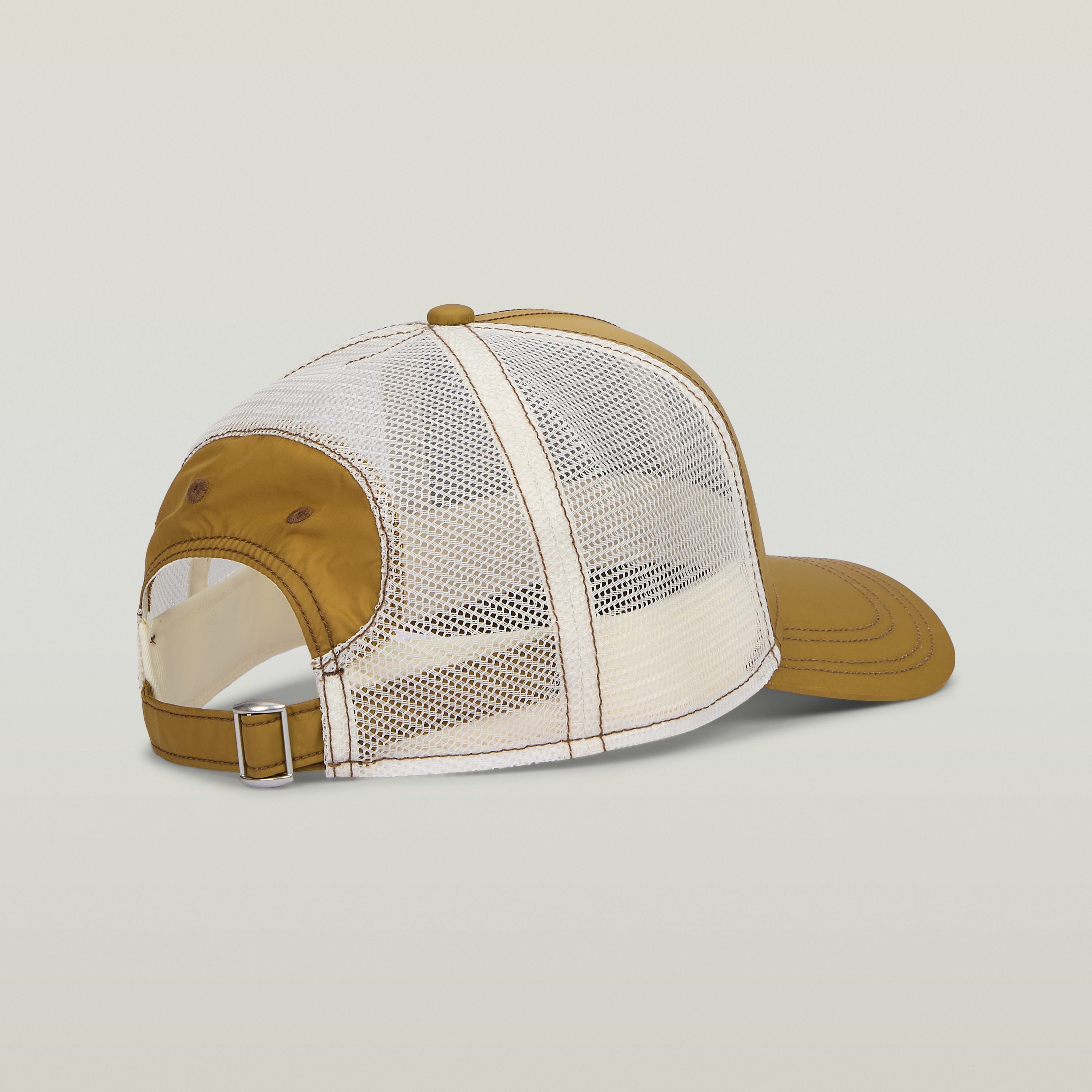 Baseball trucker cap with clip closure featuring classic trucker design and mesh ventilation.