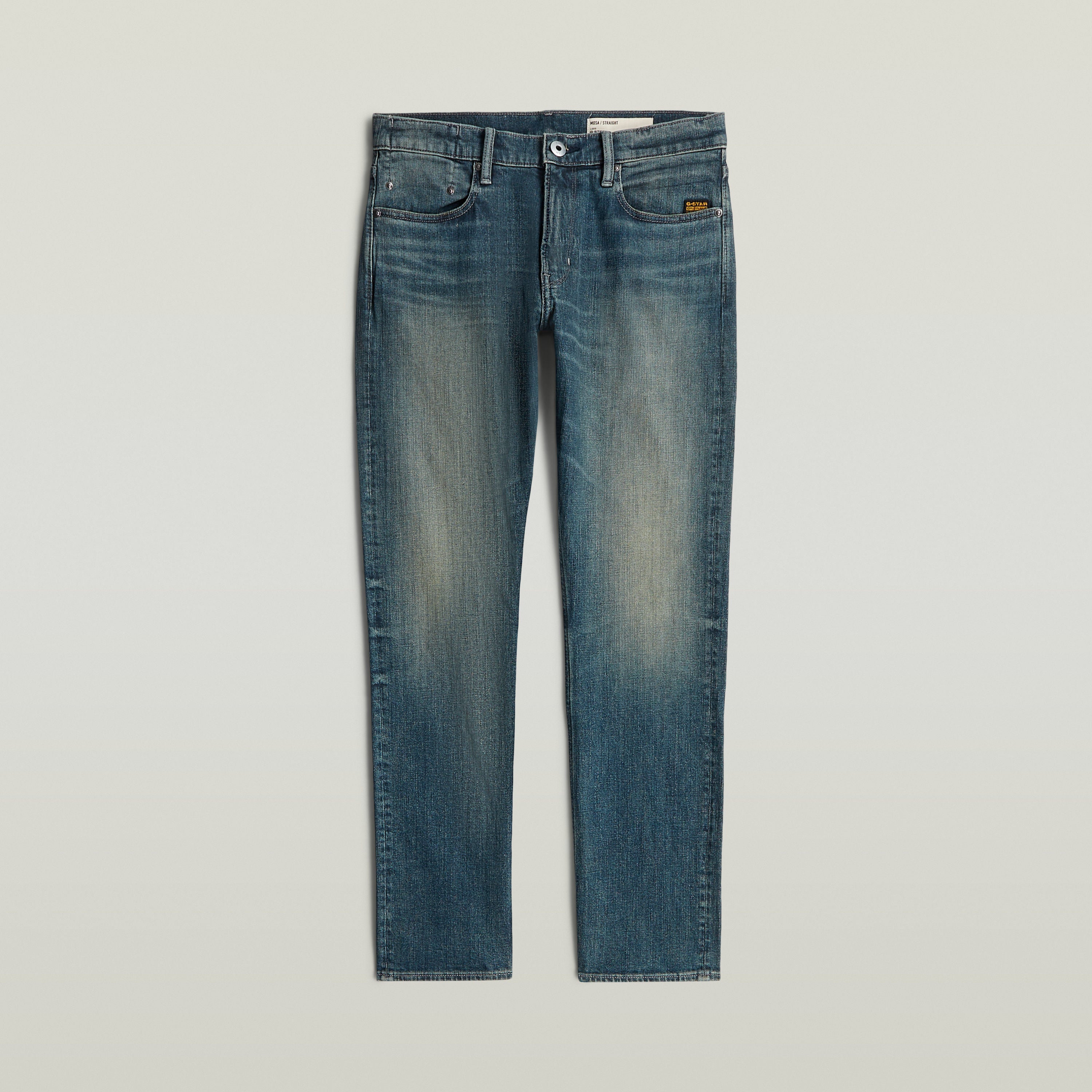 Mosa straight jeans, medio talle, diseño atemporal, pierna estrecha, teñido índigo con matiz verde.