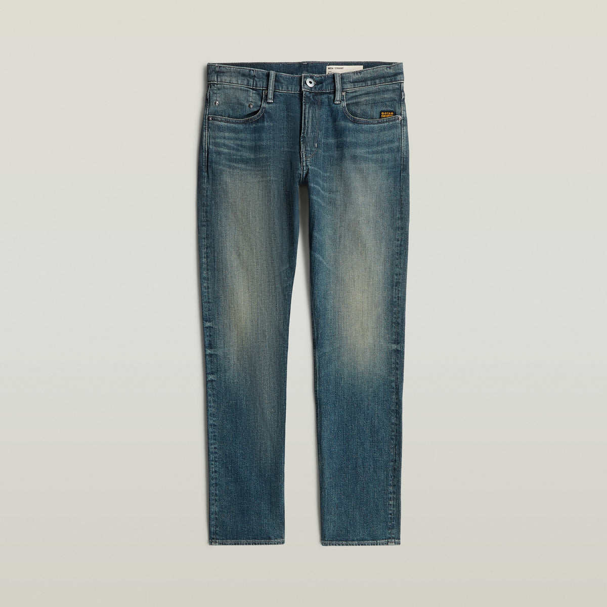 Mosa straight jeans, medio talle, diseño atemporal, pierna estrecha, teñido índigo con matiz verde.