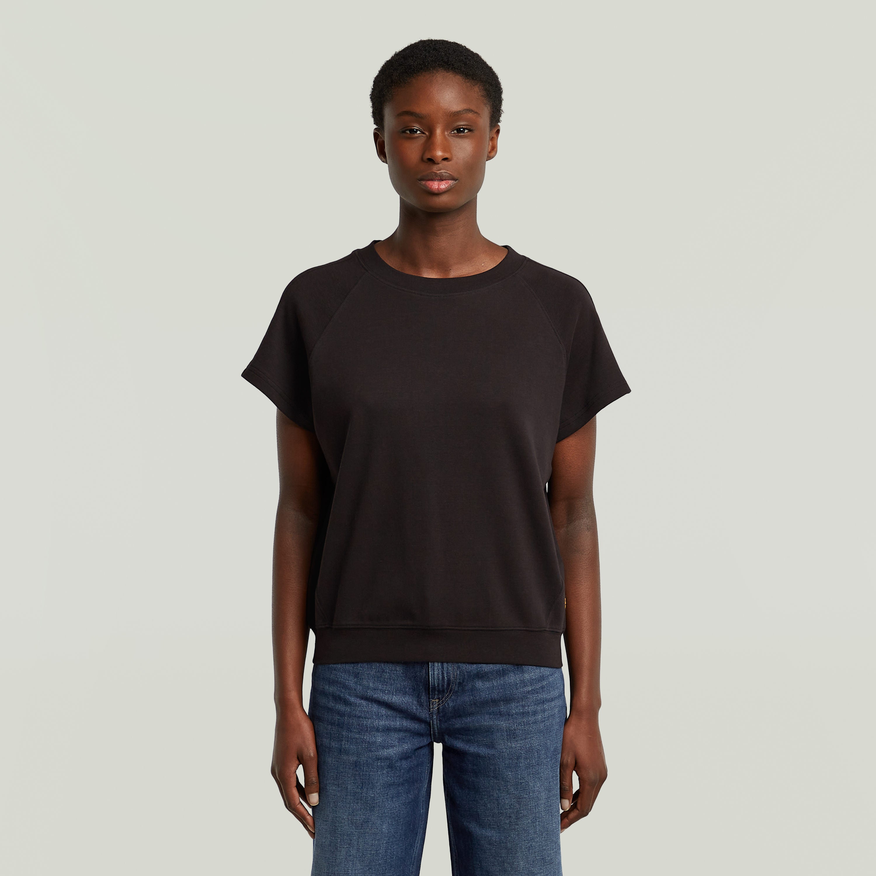 La camiseta Raglan tiene un corte recto con mangas de casquillo y cuello redondo. Cuello redondo 100 % algodón,Elástico cómodo,Material ligero Dk Black