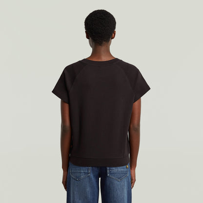 La camiseta Raglan tiene un corte recto con mangas de casquillo y cuello redondo. Cuello redondo 100 % algodón,Elástico cómodo,Material ligero Dk Black