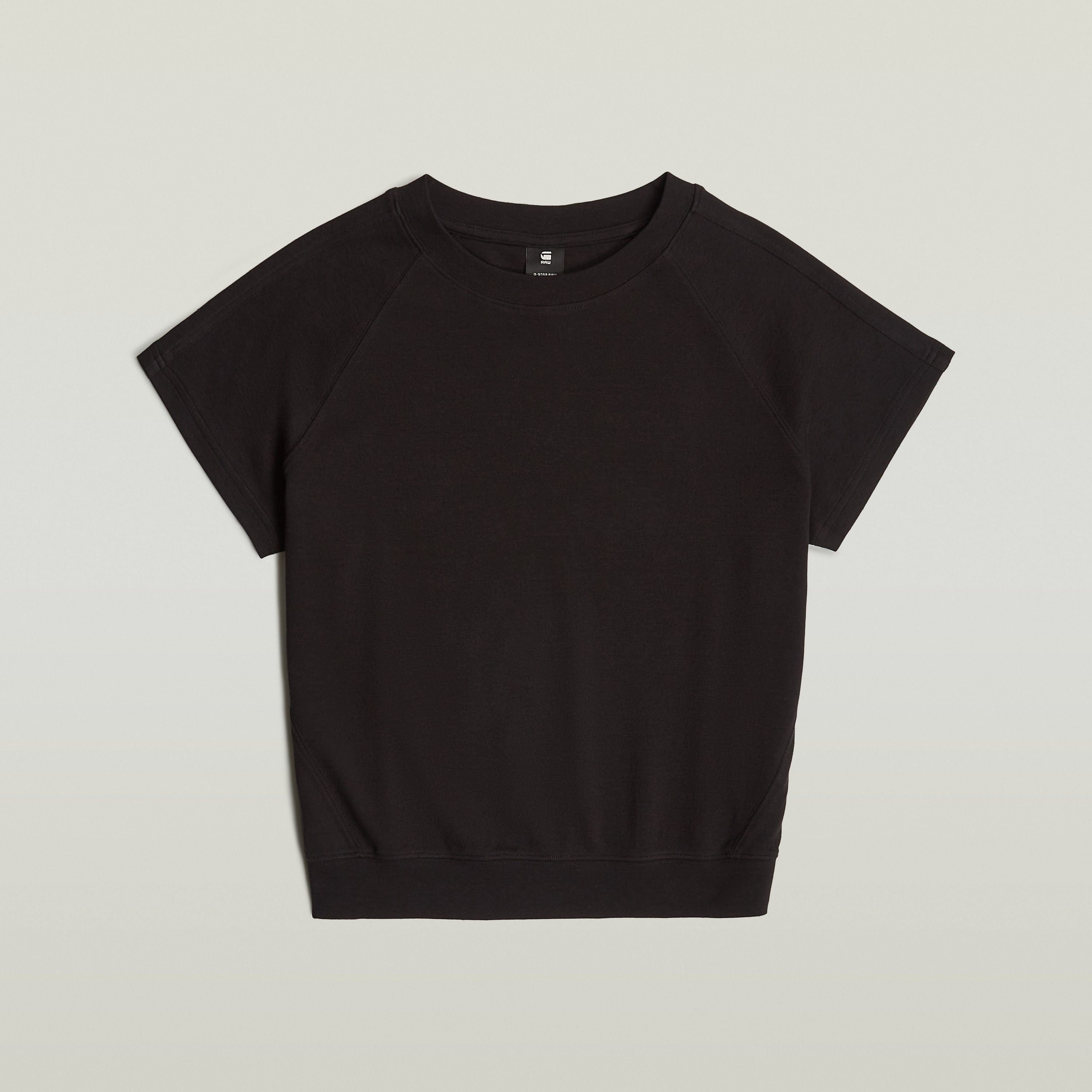 La camiseta Raglan tiene un corte recto con mangas de casquillo y cuello redondo. Cuello redondo 100 % algodón,Elástico cómodo,Material ligero Dk Black