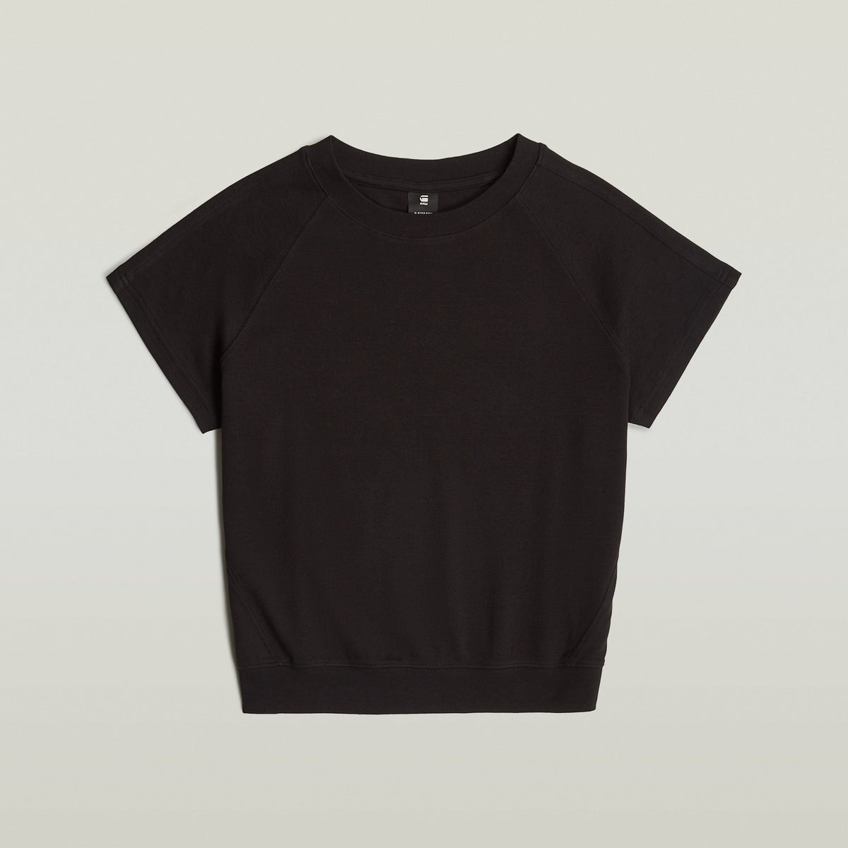 La camiseta Raglan tiene un corte recto con mangas de casquillo y cuello redondo. Cuello redondo 100 % algodón,Elástico cómodo,Material ligero Dk Black
