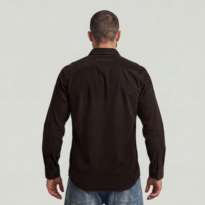 Back view of a man wearing a classic regular fit button-up shirt in brown with button closure.