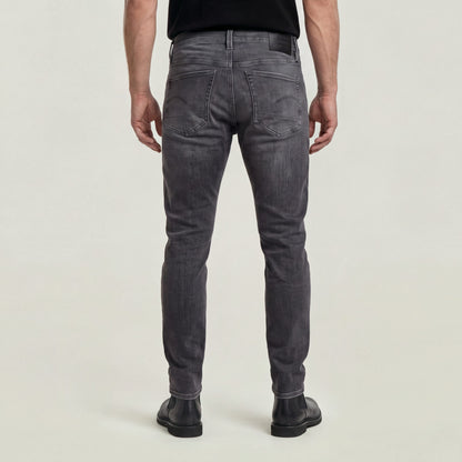 Con una confección atemporal y un corte ajustado, los vaqueros 3301 son un auténtico básico del armario. Hechos para durar. Perfecto para el día a día. Bragueta de botones,Cinco bolsillos,Etiqueta trasera de G-Star RAW hecha de un tejido de papel que imita a la piel 91 % Algodón, 8 % Elastomultiéster (T400® EcoMade), 1 % Elastano (LYCRA®),Superelástico,Denim de 10,2 onzas de peso,Sarga cruzada 3x1 Faded Black Magnet