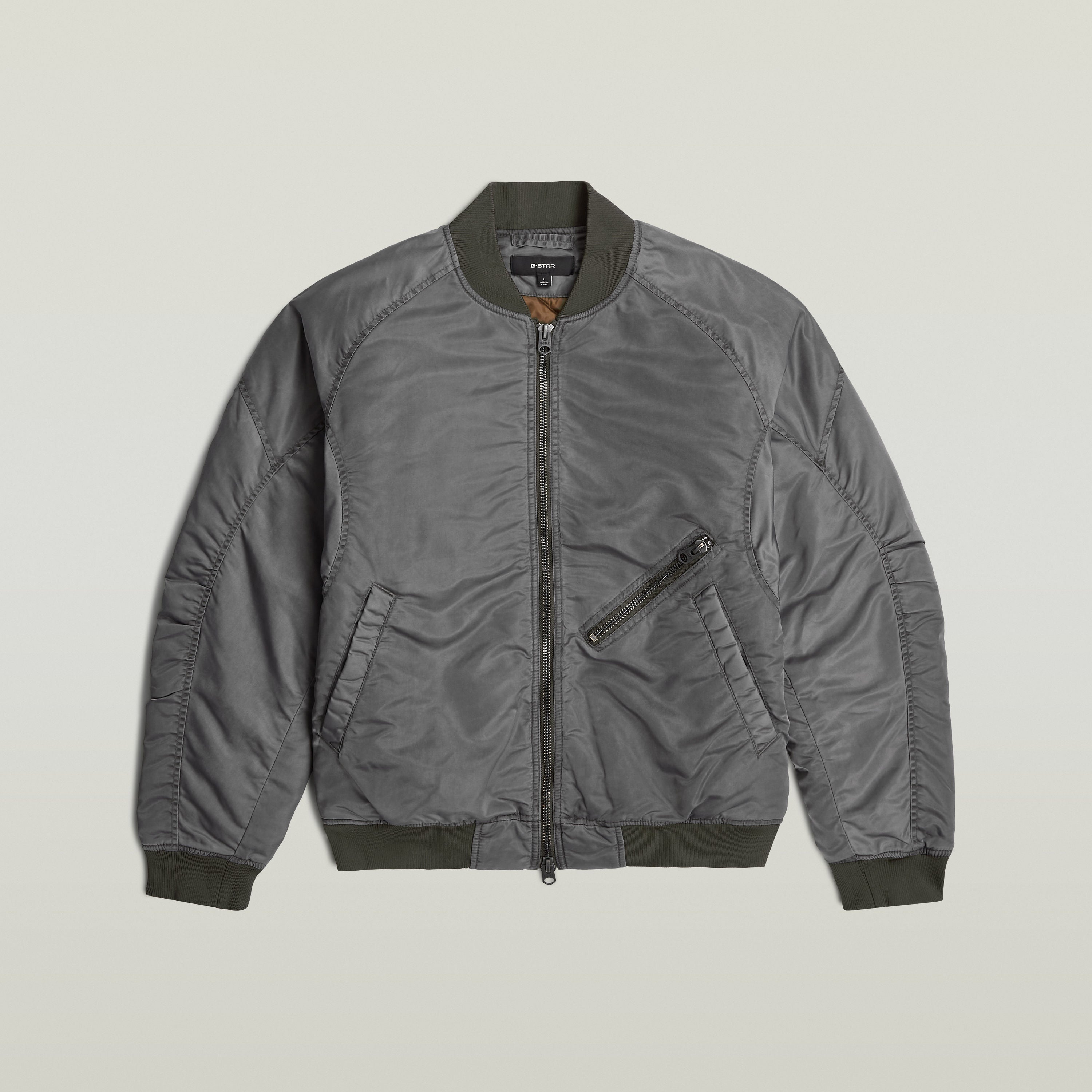 GA-1 Lightweight Padded Bomber jacket in gray, featuring zipper closure and ribbed collar.