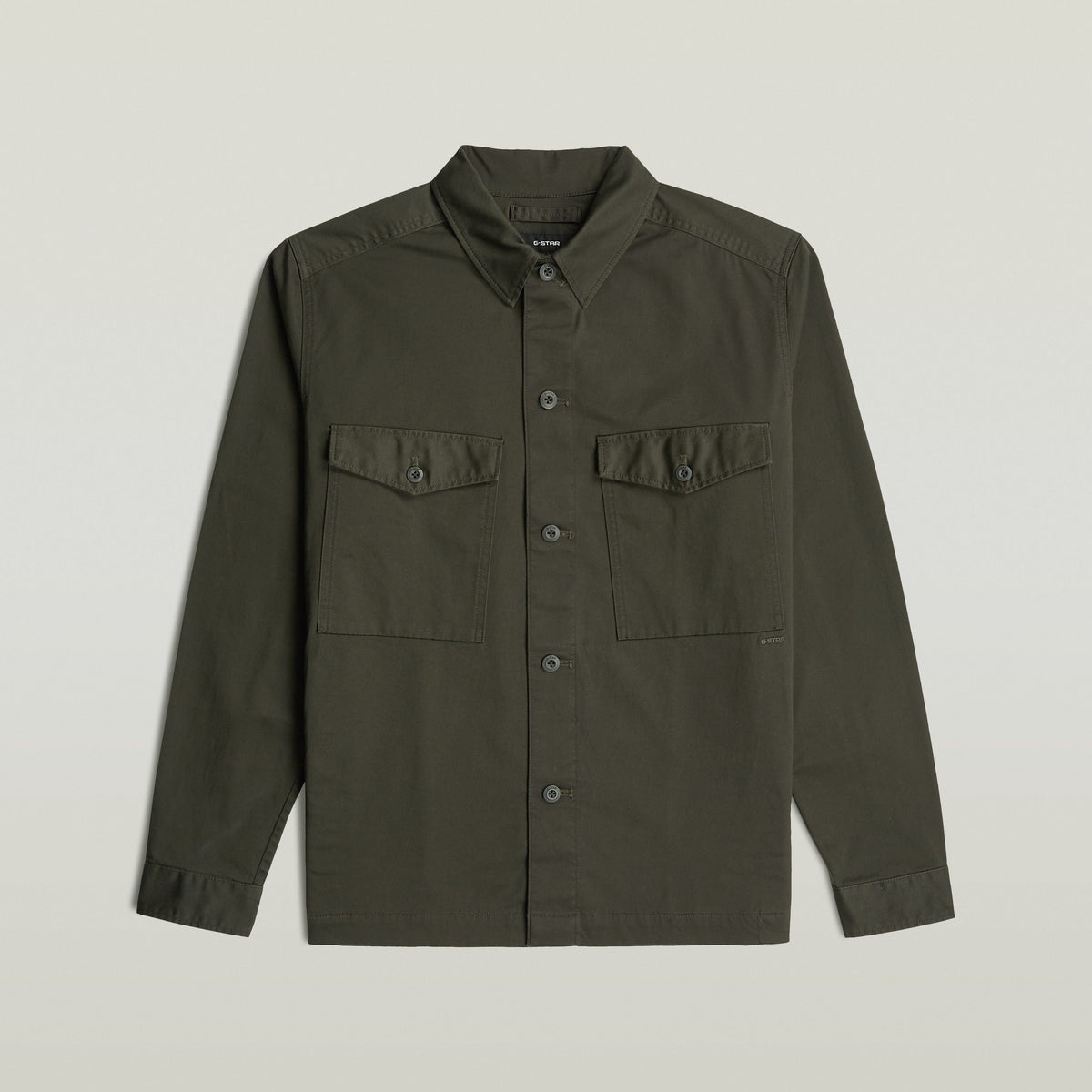 Core Lightweight Overshirt in dark green with a classic lightweight overshirt design and button closure.