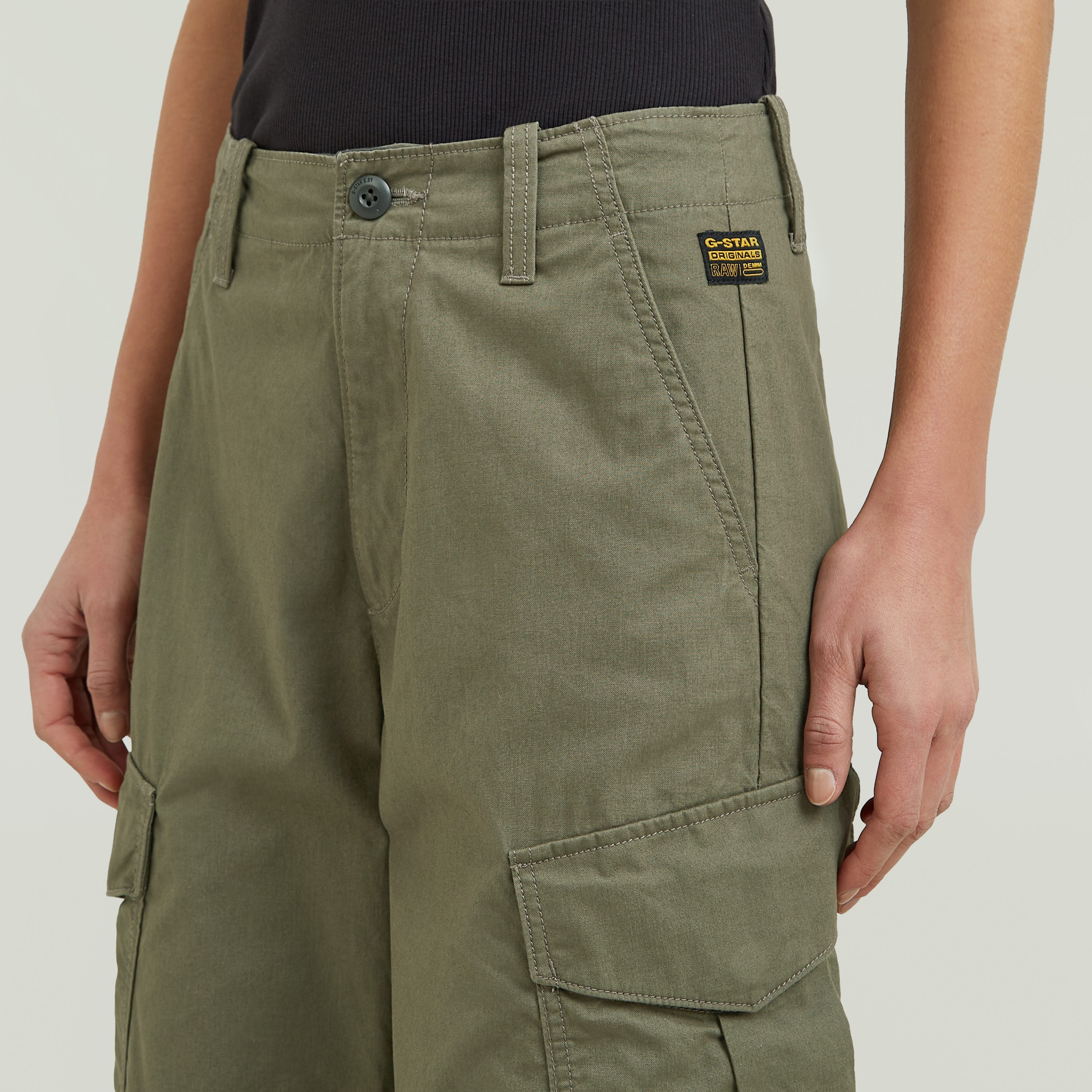 Holt loose fit cargo pants featuring a relaxed fit, mid-rise design, and multiple practical pockets.