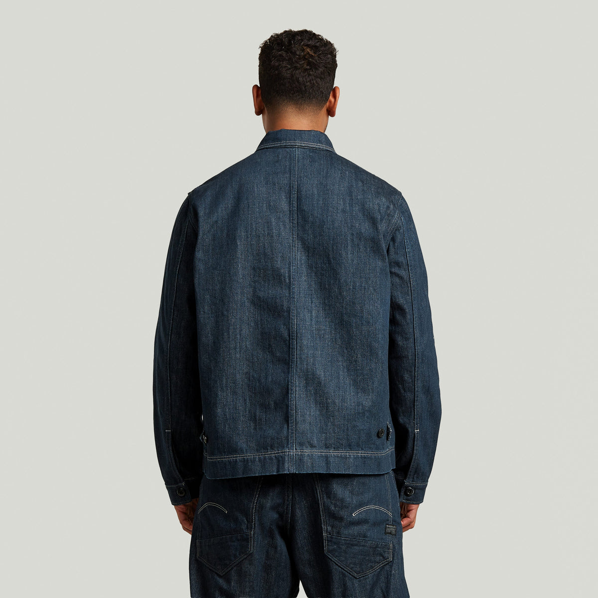 Boxy Clean Neo Raw Overshirt back view showcasing denim greencast material and regular fit.