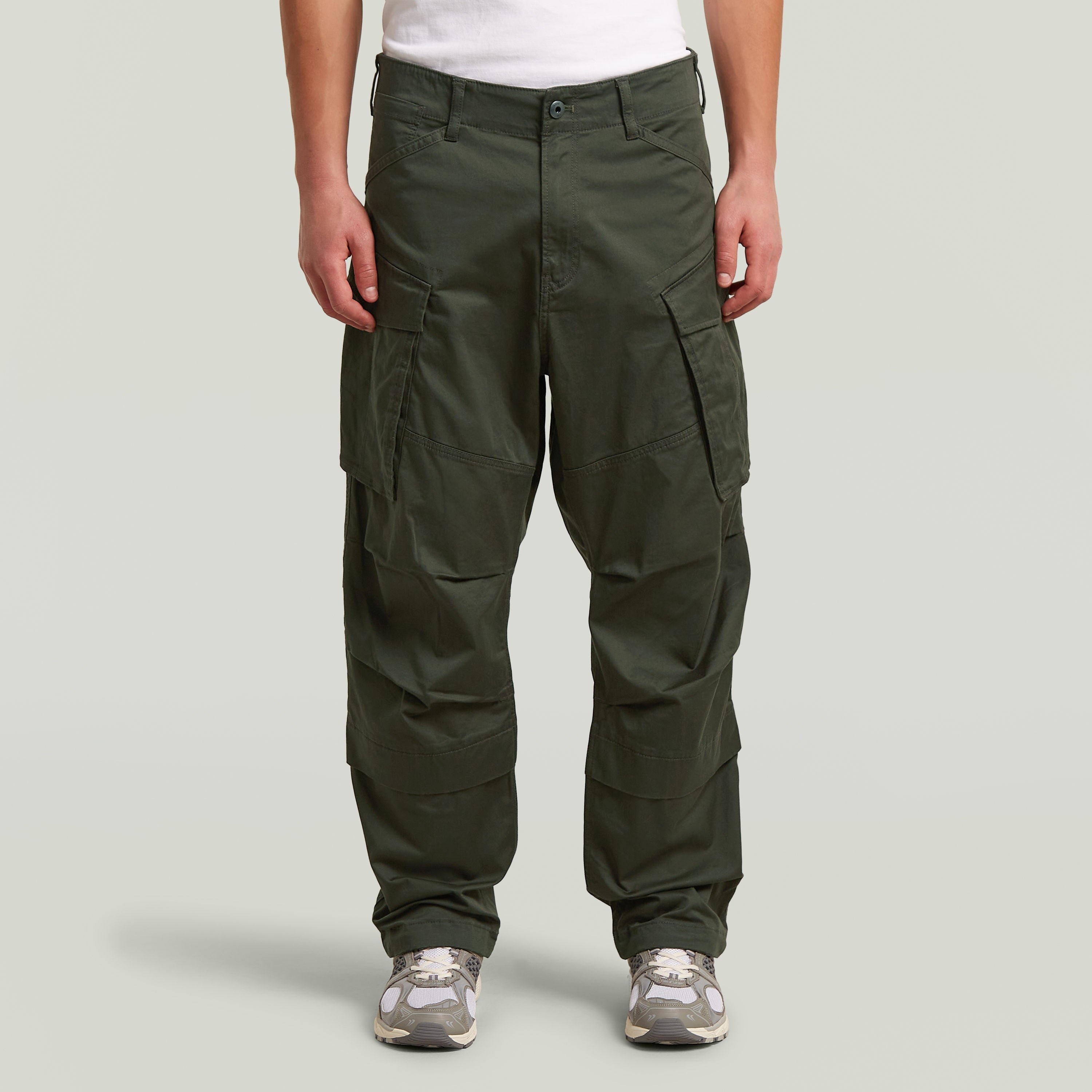 Rovic 3D Relaxed Pants in olive green, showcasing relaxed fit 3D pants with multiple pockets and a baggy style.