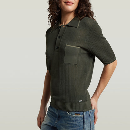 Structure Polo Knit in olive green, a classic knit polo shirt with button closure and a chest pocket.