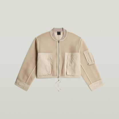 Mixed Media Relaxed Zip Thru Sweater in beige featuring a relaxed fit and zip closure.