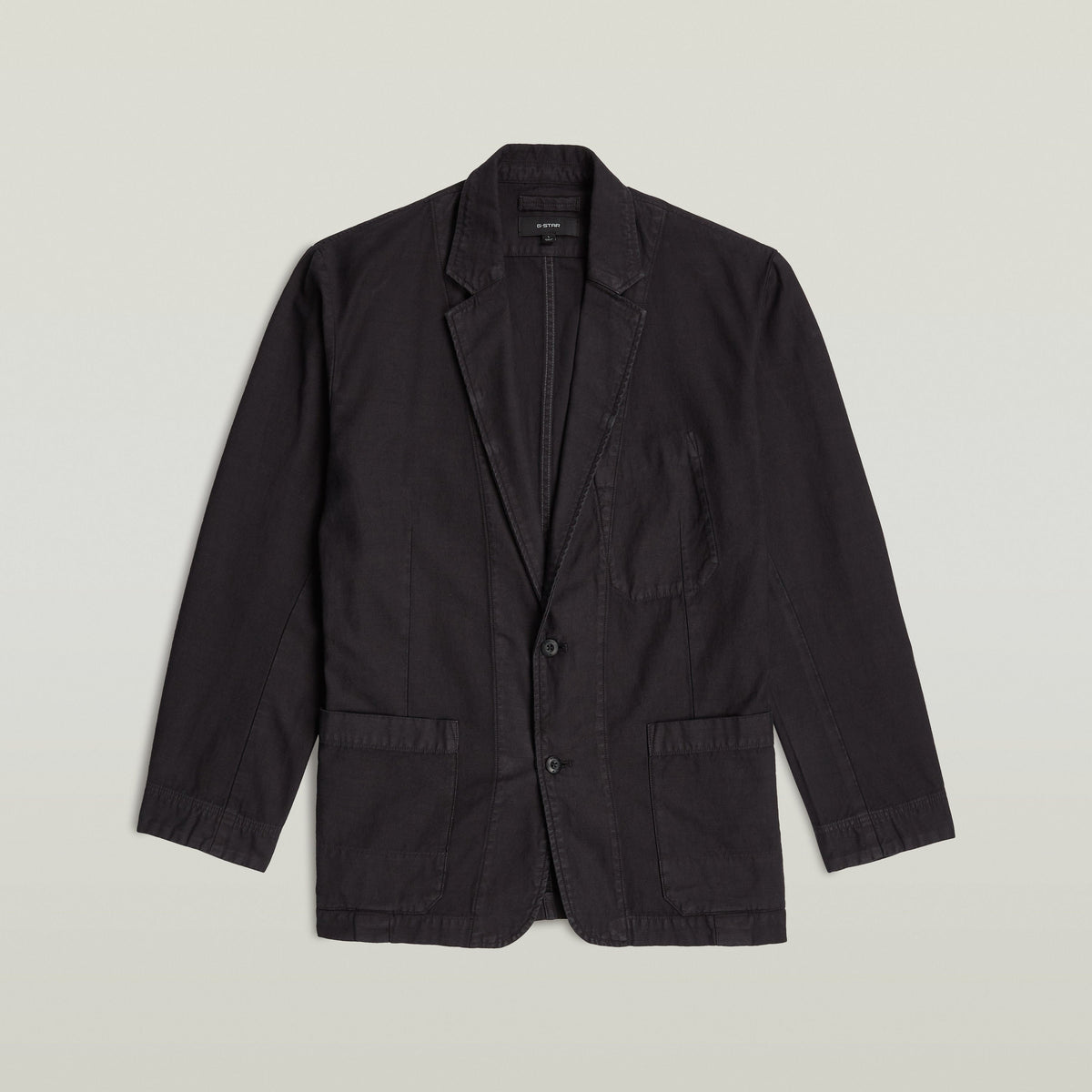 Casual sport blazer in black with a relaxed fit, notched collar, and button closure for a classic look.