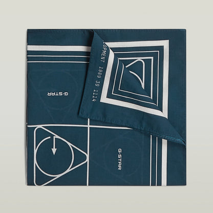 Geometric print bandana featuring a bold geometric design in dark blue and white.