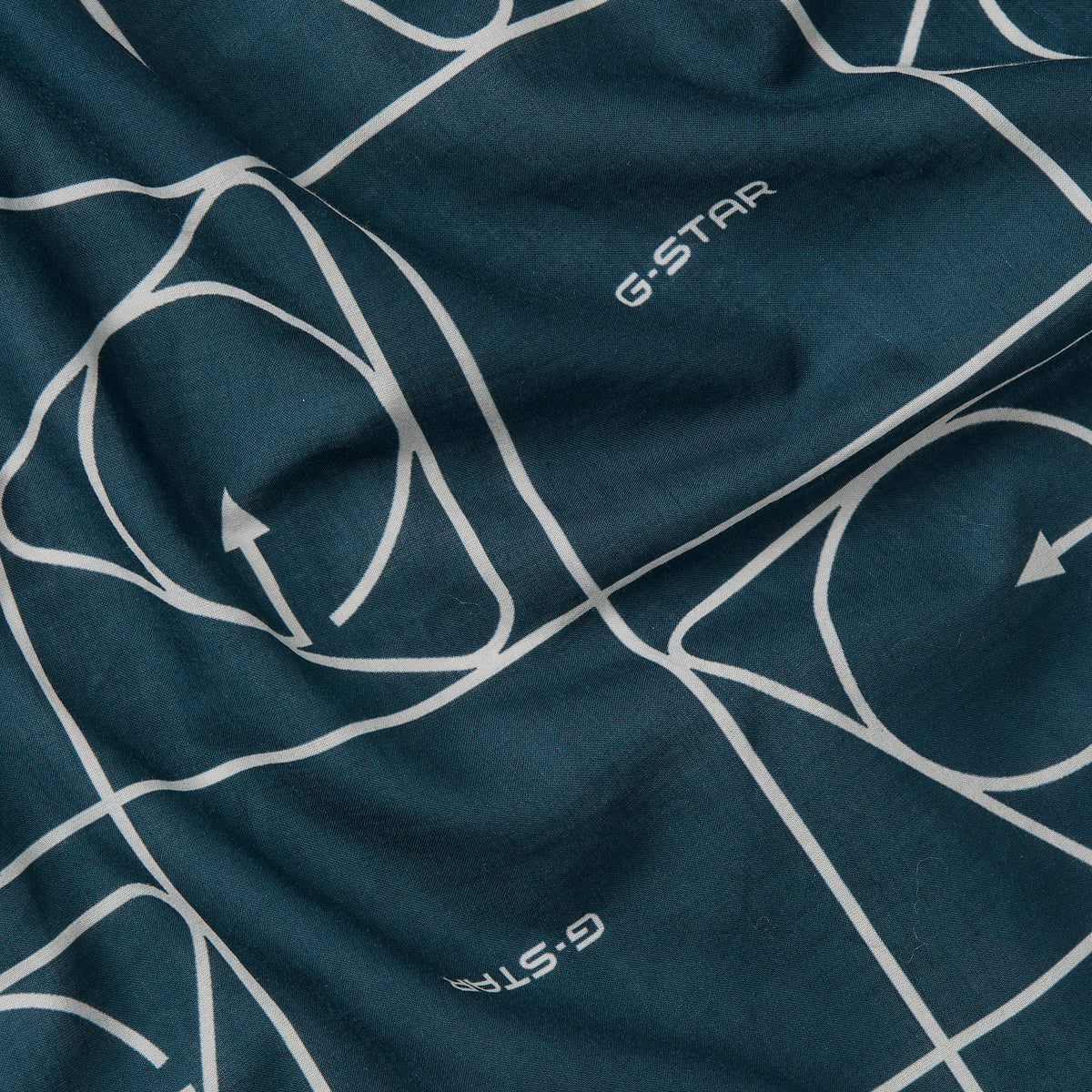 Geometric print bandana with dark blue background and white geometric design by G-Star.