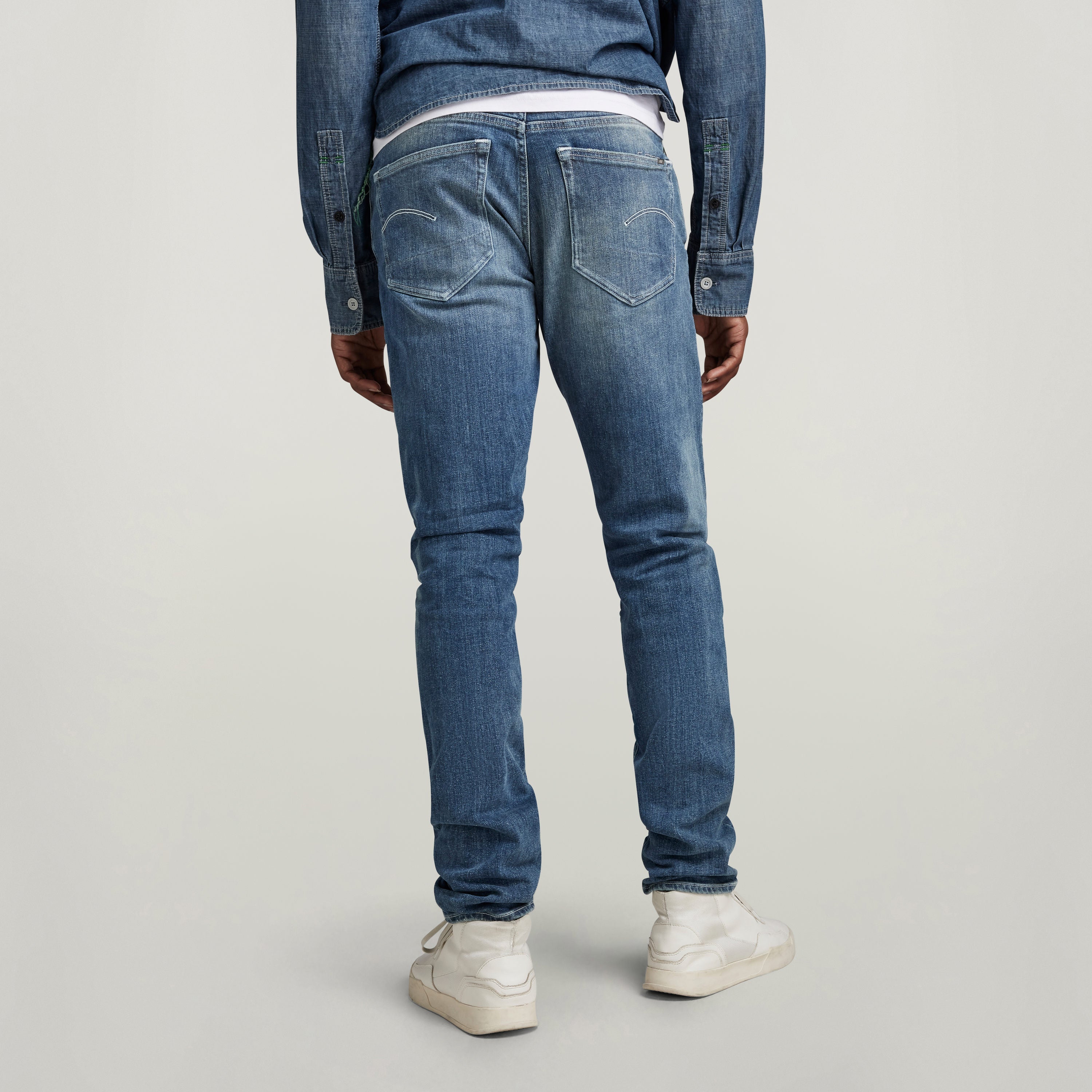 Vista trasera de los G-Star 3301 Slim jeans en denim de ajuste ceñido con detalles de desgaste.