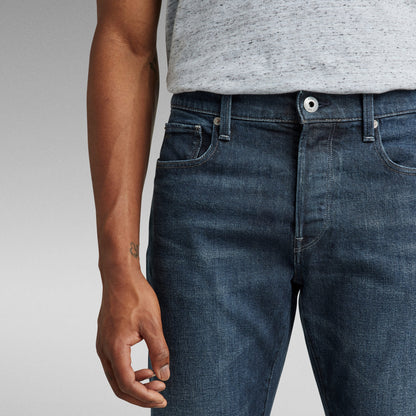 G-Star 3301 slim jeans shown in close-up with a medium rise and classic five-pocket design.
