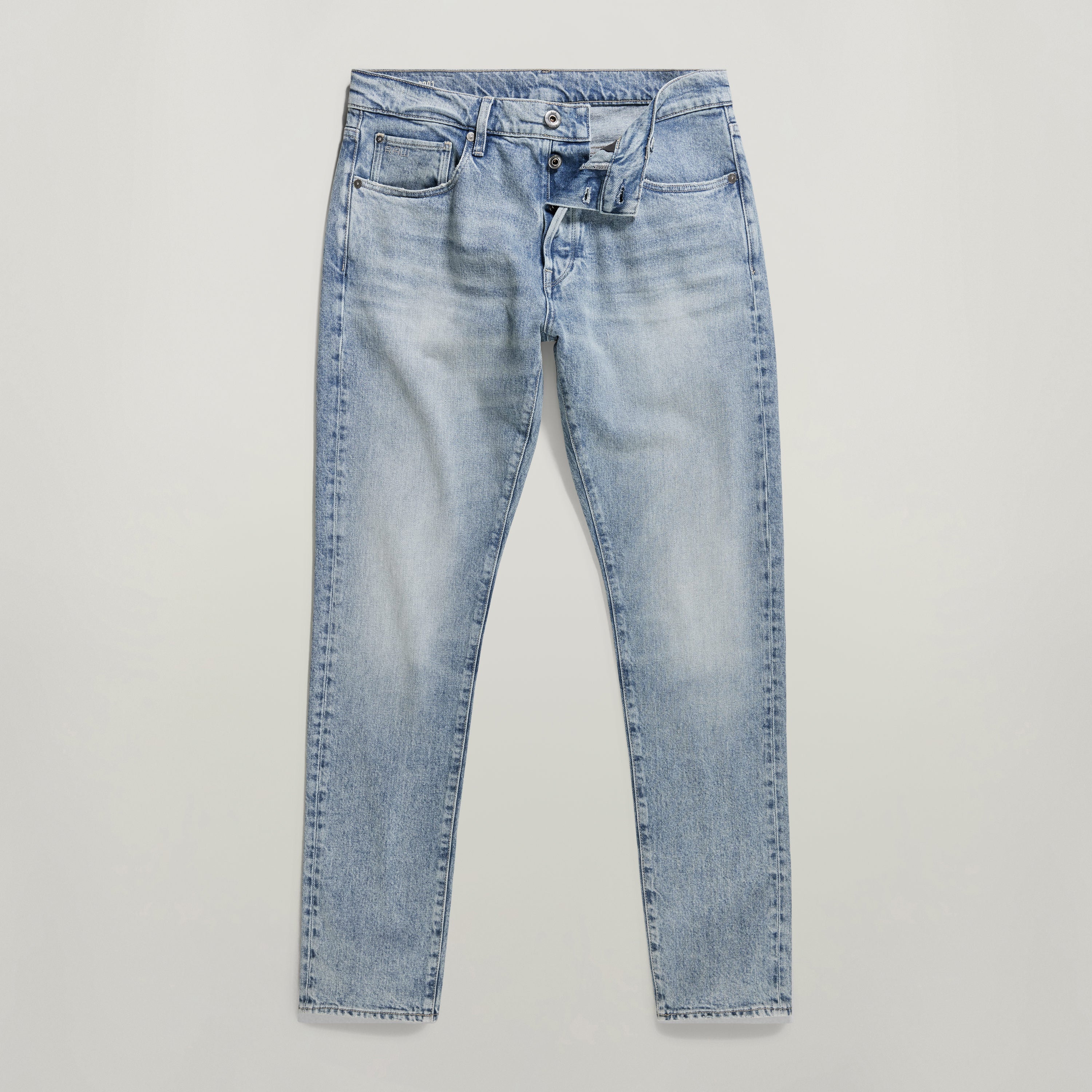 Jeans 3301 Slim de G-Star, estilo inspirado en el Oeste, bragueta de botones y corte ajustado, color azul vintage.