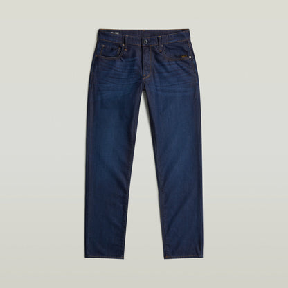 Jeans G-Star 3301 Straight en denim de color índigo con construcción de cinco bolsillos.