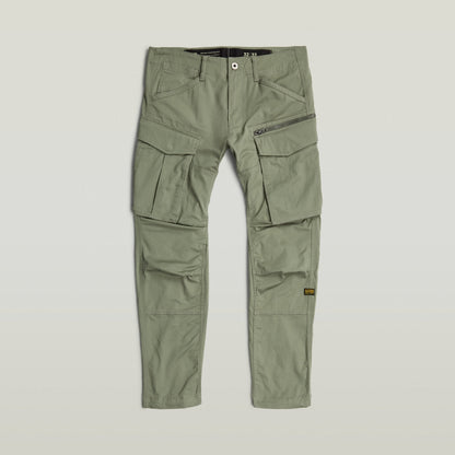 Pantalones Rovic Zip 3D Regular Tapered de color verde con múltiples bolsillos y cierre de cremallera.