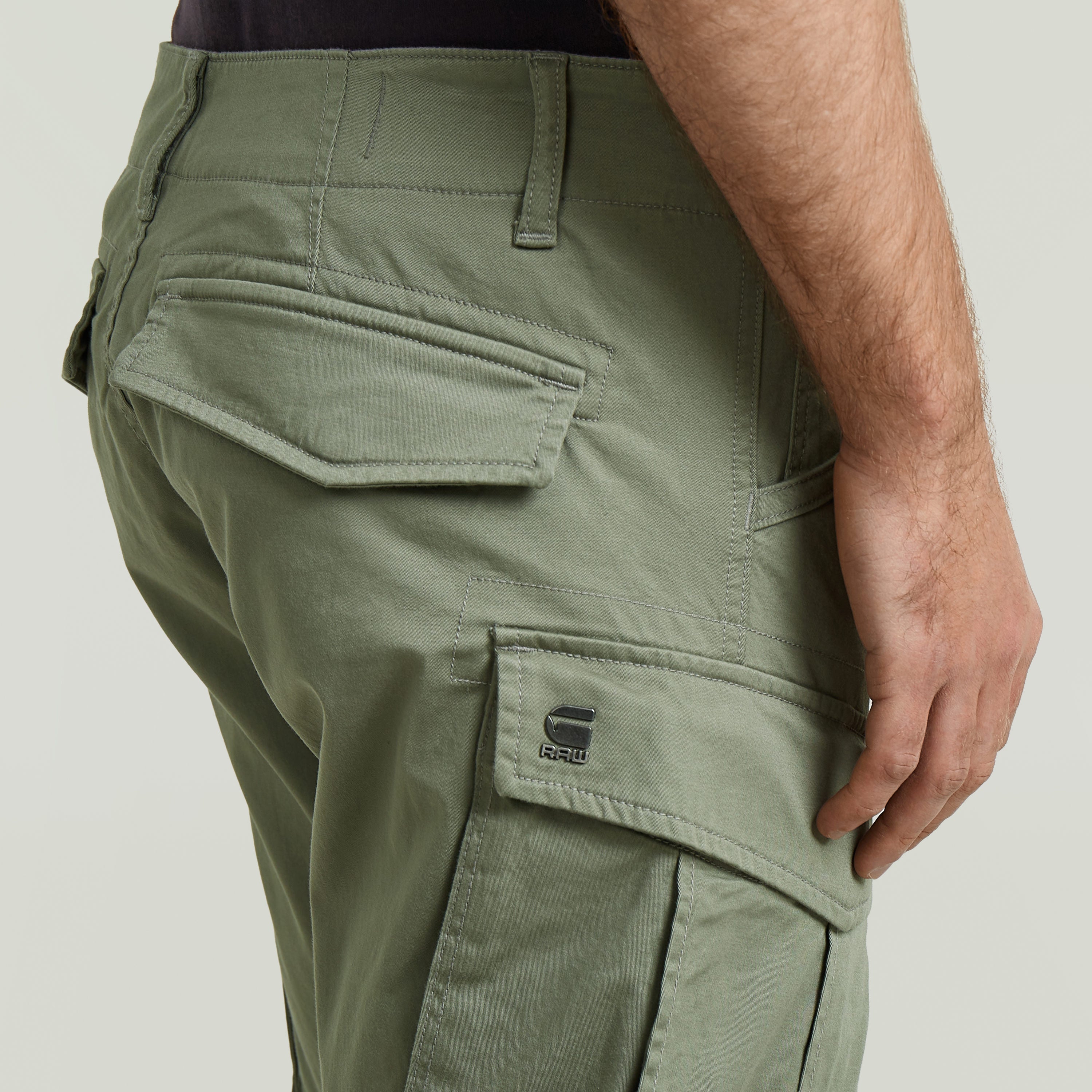 Rovic Zip 3D tapered pants showcasing detail of the back pocket and tailored fit.