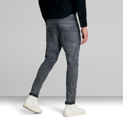 D-Staq slim fit jeans showcased on a model from the back, featuring a sleek design with multiple pockets.