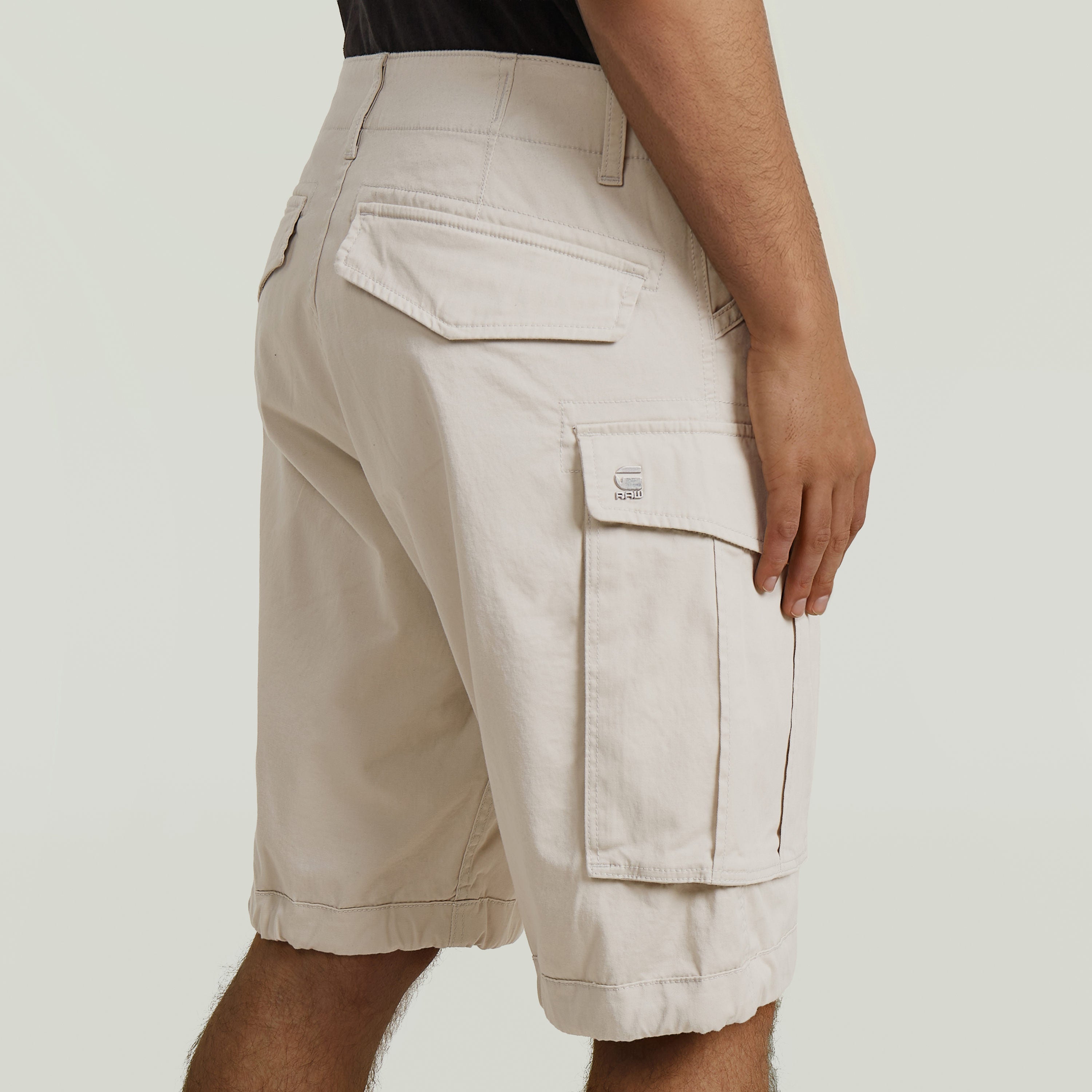 Relaxed fit zip shorts featuring multiple functional pockets in a stylish design.