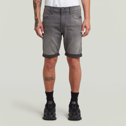 G-Star 3301 slim denim shorts displayed on a model, featuring five pockets and rolled cuffs, in grey denim.