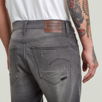 G-Star 3301 slim denim shorts showing back detail and label on gray denim fabric.