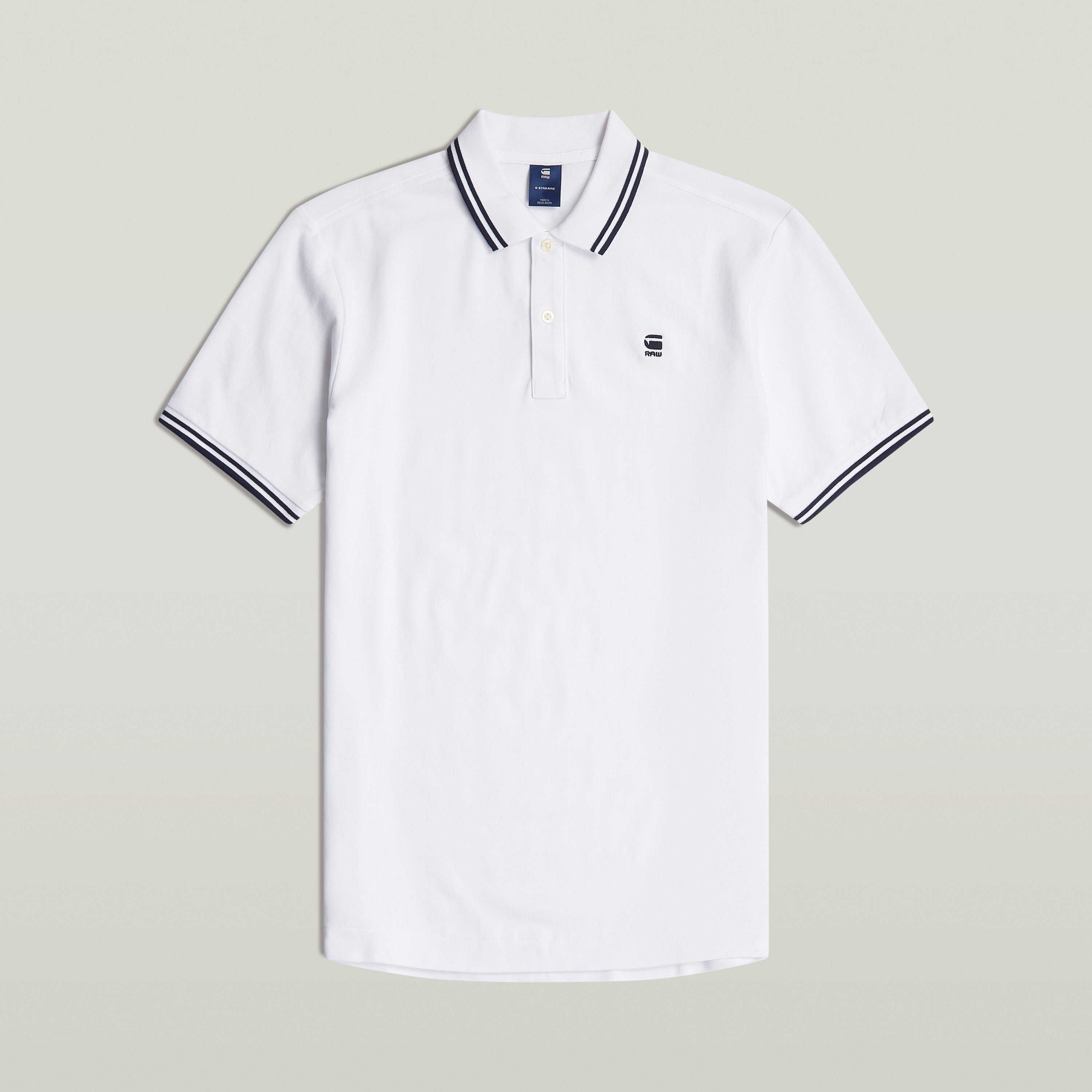 Polo Dunda Slim Stripe, slim stripe polo shirt, blanco, con cuello y puños acanalados. Detalle de bordado de G-Star RAW.