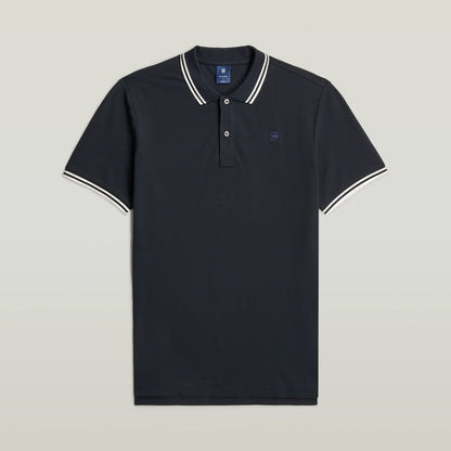 Polo Dunda Slim Stripe azul oscuro con corte ajustado y detalles de rayas, ideal como slim stripe polo shirt.