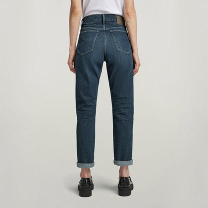 Virjinya slim high-waisted jeans displayed from the back, showcasing high waist and fitted ankle design.