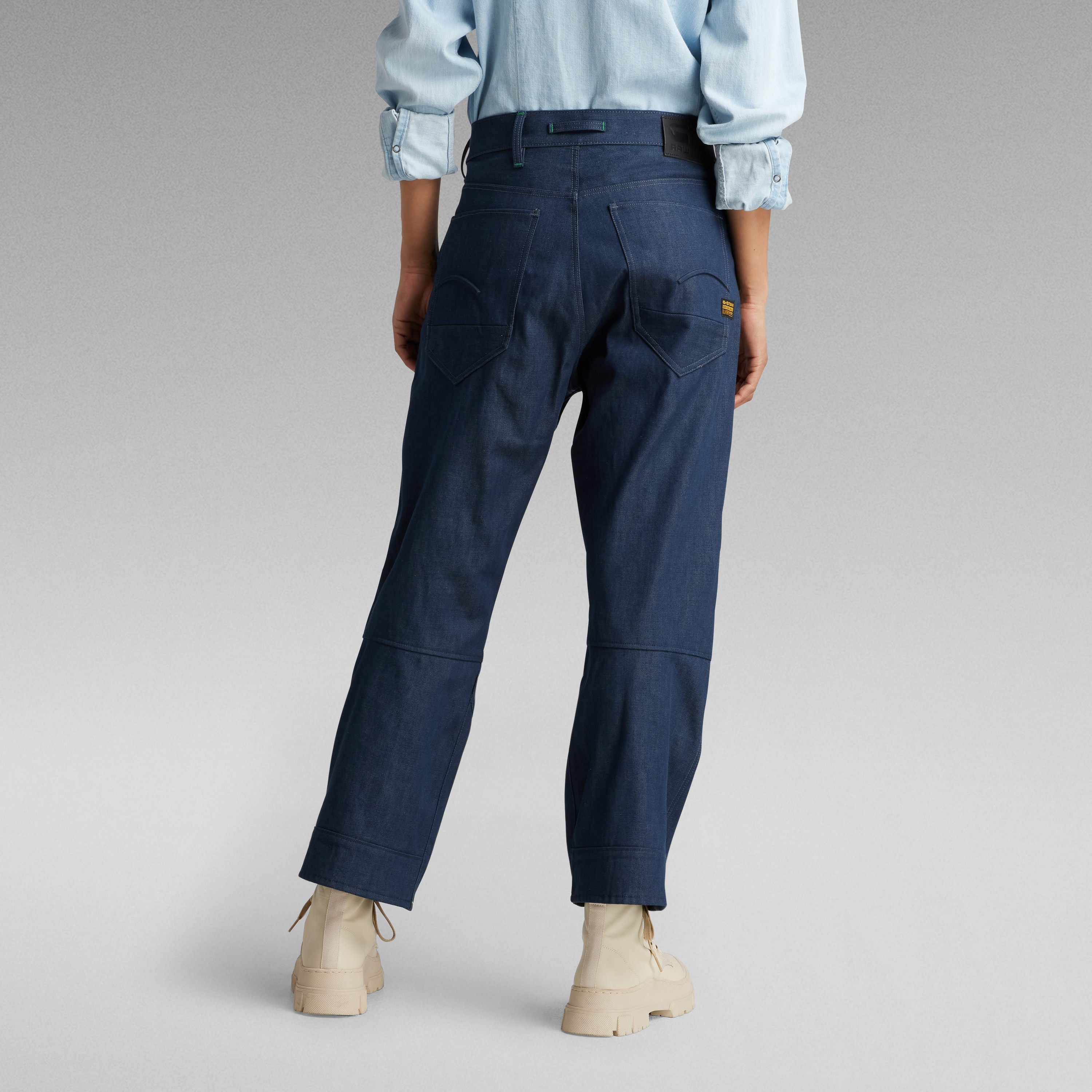 Women wearing G Star Noxer Bootcut jeans, showcasing a stylish bootcut fit, ideal for casual wear.