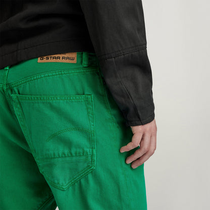 G-Star Arc 3D jeans in vibrant green with detailed stitching and iconic brand tag on the back.