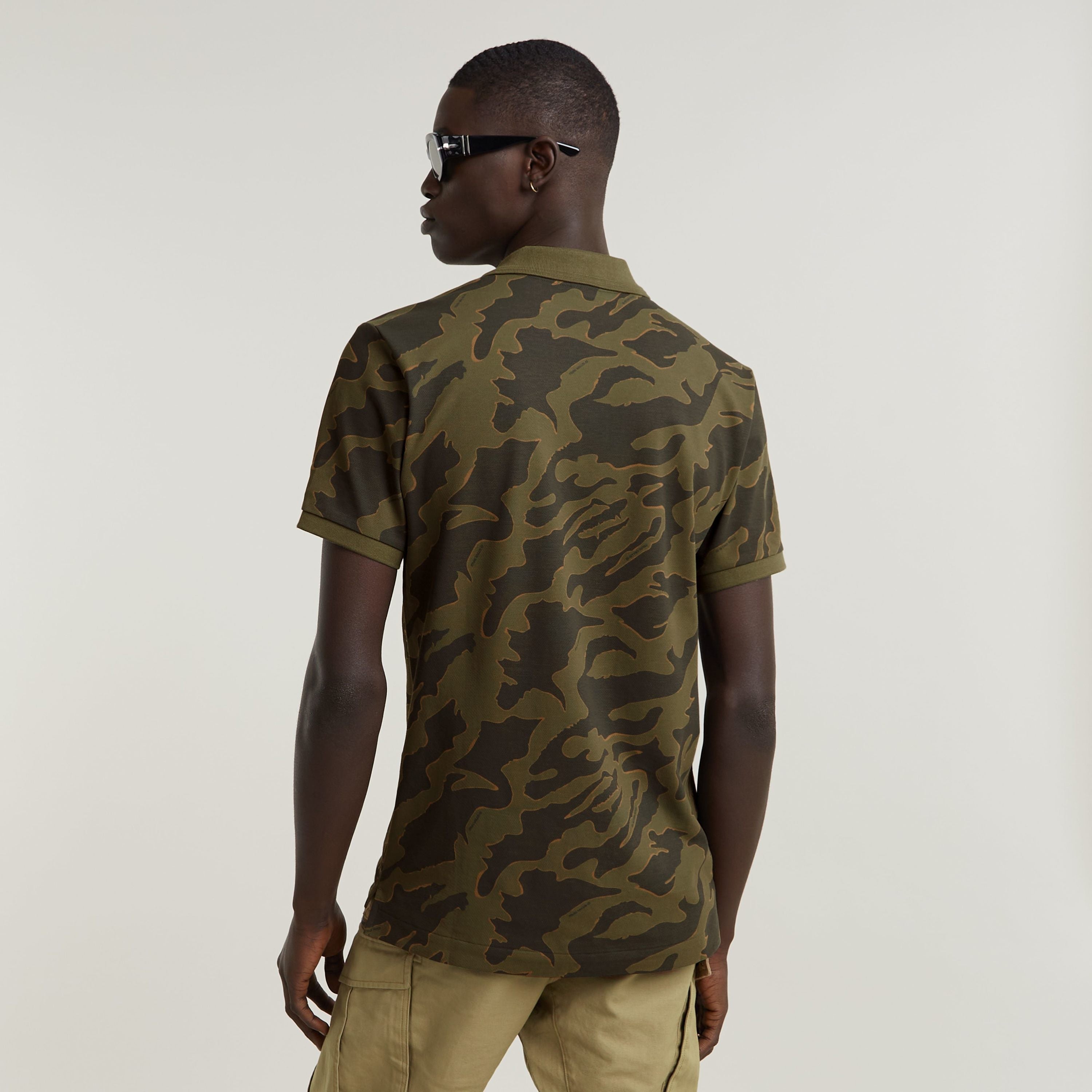 Polo slim stripe polo shirt in camouflage design, featuring short sleeves and a sleek back view.