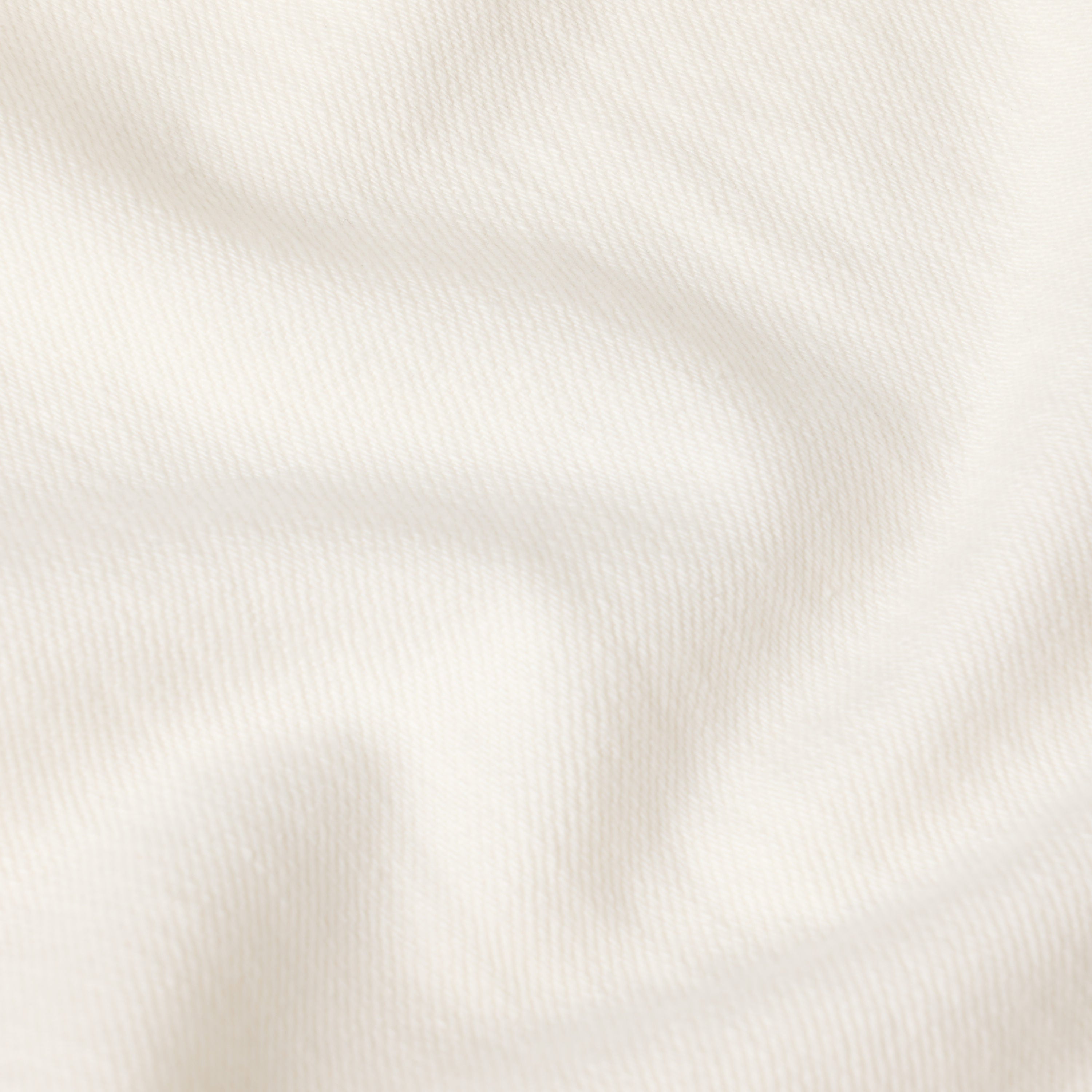 close-up of soft fabric texture for loose fit low rise jeans