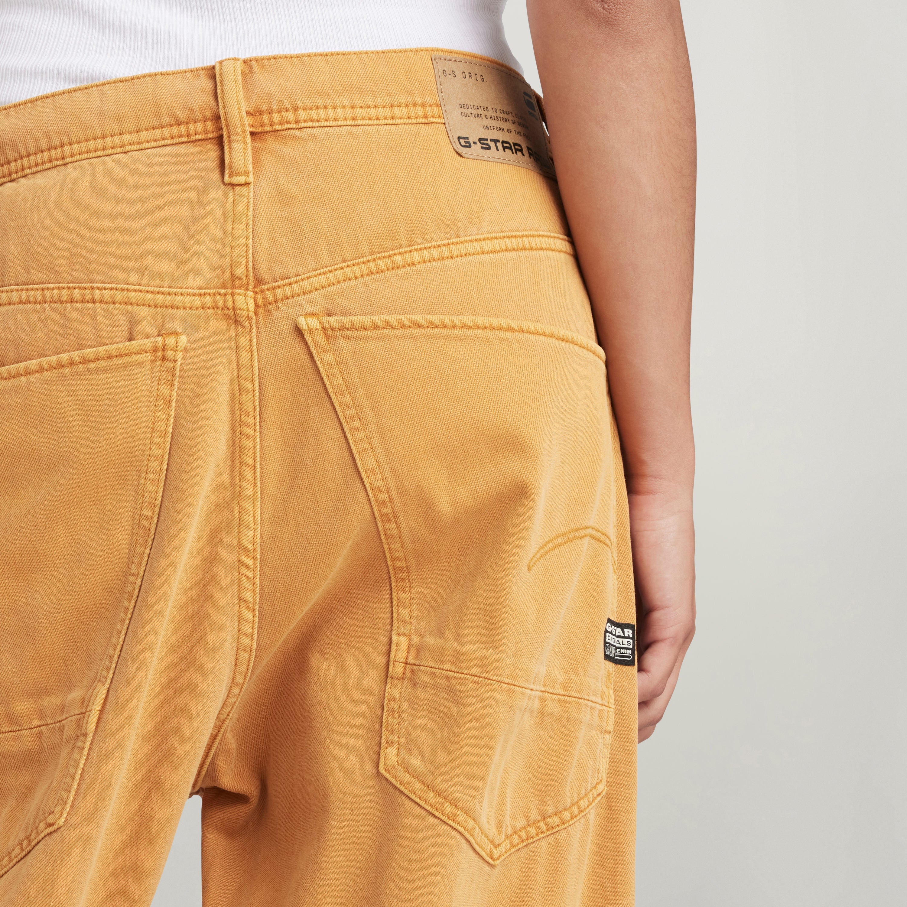 Loose unisex jeans from G-Star showcasing detailed back pockets and waistband design.