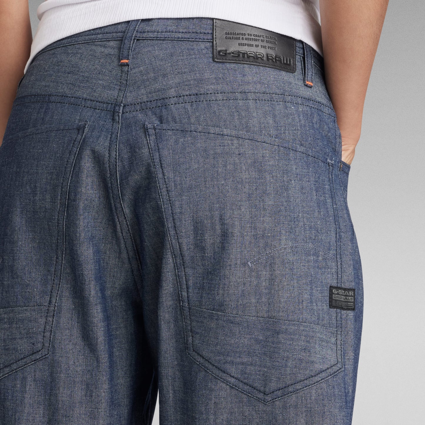 Arc 3D loose unisex jeans showing back pockets and waistband detail.