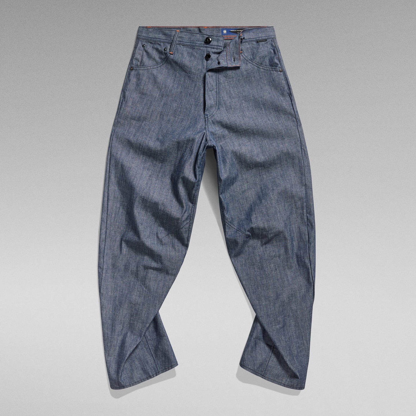 Arc 3D loose unisex jeans displayed flat, showcasing regular waist cut and drop-crotch style.