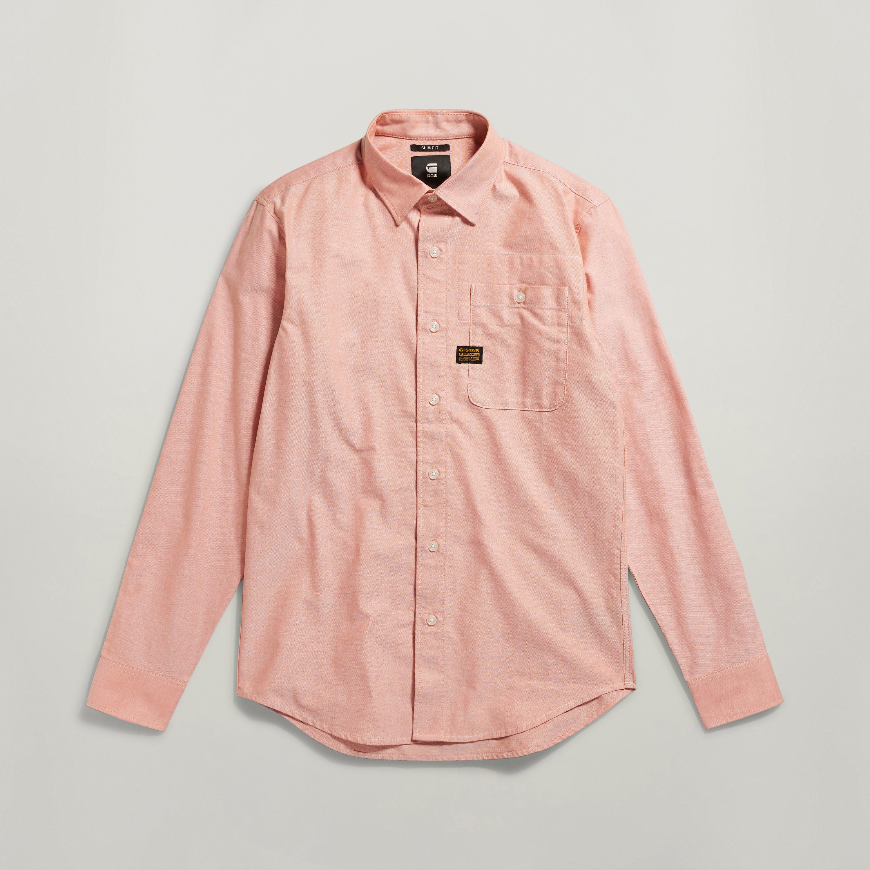 Camisa Bristum 2.0 slim fit de corte ajustado color rosa con bolsillo en el pecho y cierre de botón.