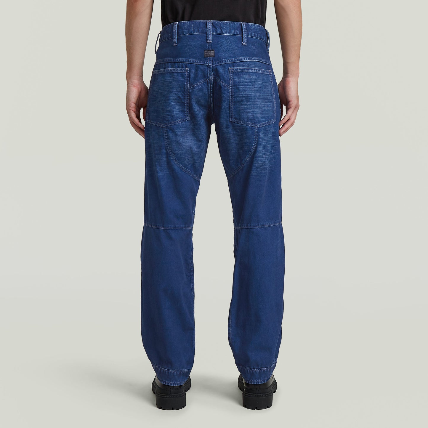 Rear view of G-STAR Elwood regular jeans showcasing iconic design and comfortable fit.