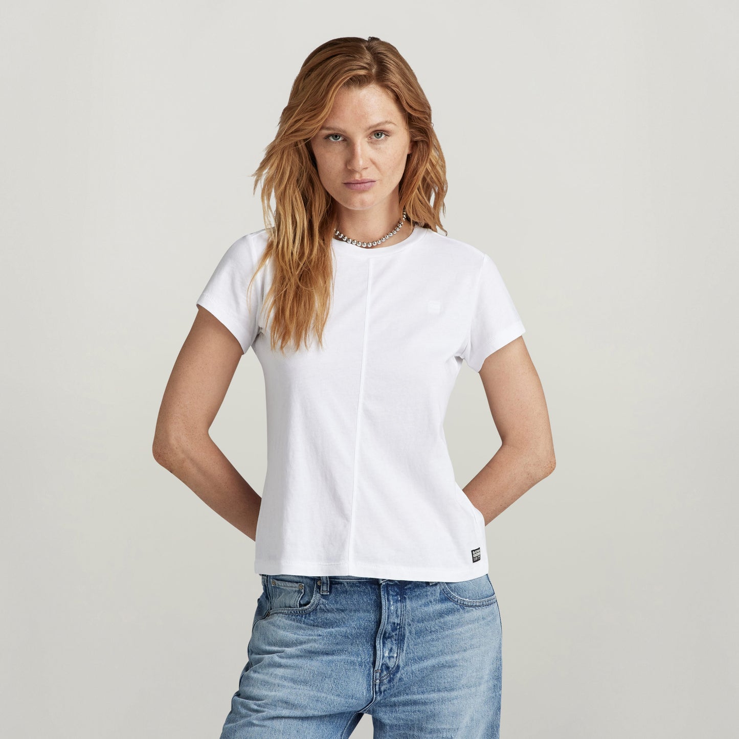 Top front seam shirt with embroidery in white, featuring unique shoulder seams and G-Star RAW logo.