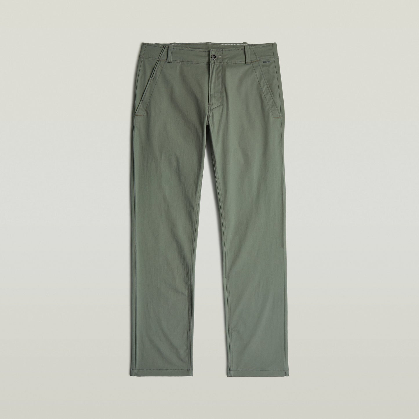 Pantalones chinos rectos Mosa en color verde, confeccionados con tejido elástico, corte de pernera recta.