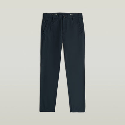 Bronson 3.0 slim chino pants displayed in a dark color with a sleek design and functional pockets.