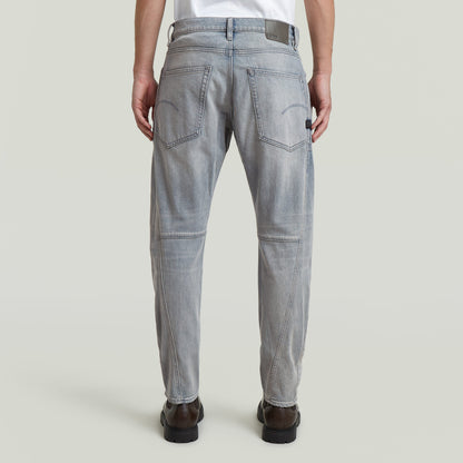 Vista trasera de jeans Contor 3D Slim en color gris, diseño moderno y cómodo con construcción tridimensional.