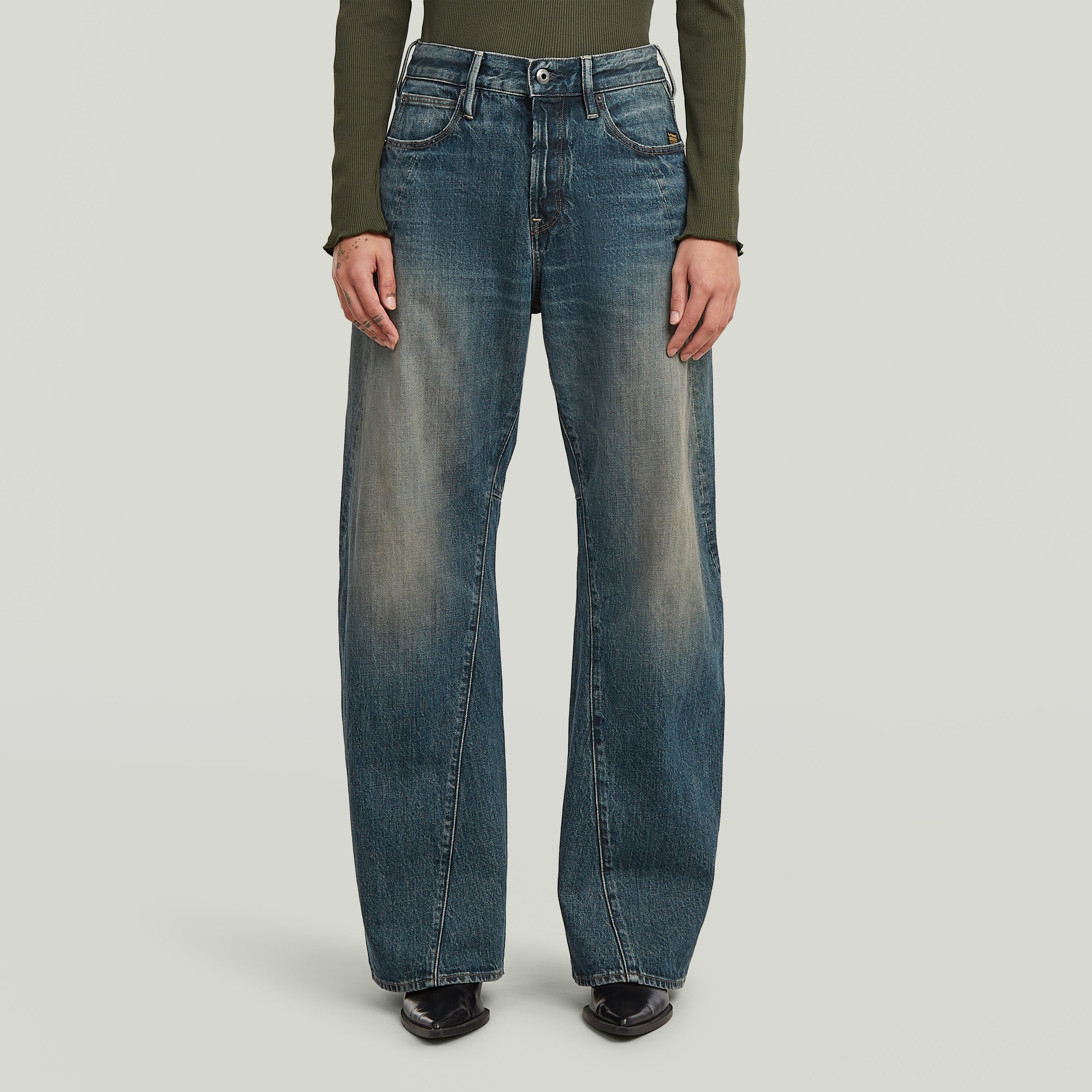 3D wide fit jeans displayed on a model, featuring a relaxed cut and unique 3D construction for improved style and comfort.